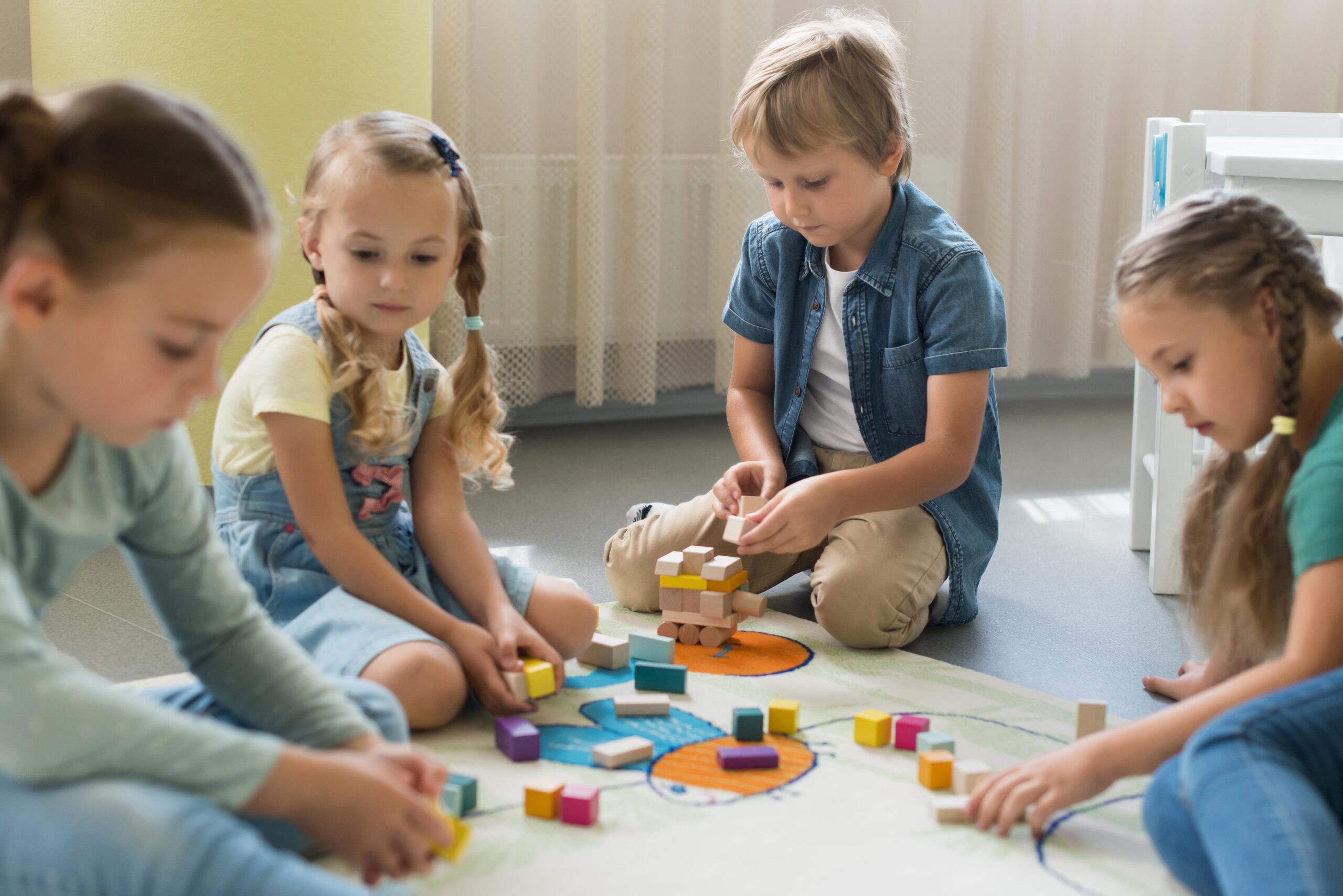 front-view-children-playing-together-kindergarten