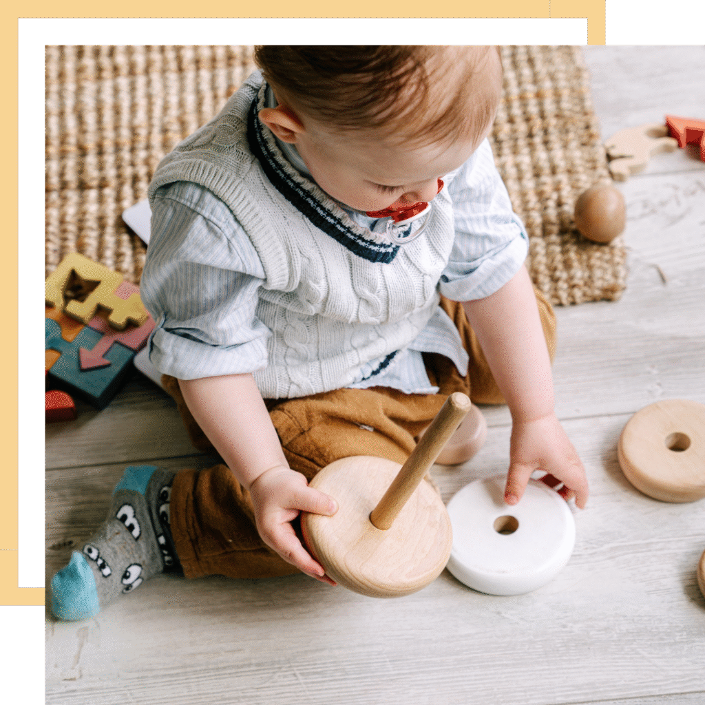 Baby building cognitive and fine motor skills